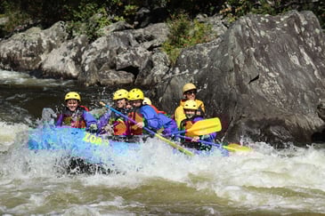 boys boarding school students white water rafting