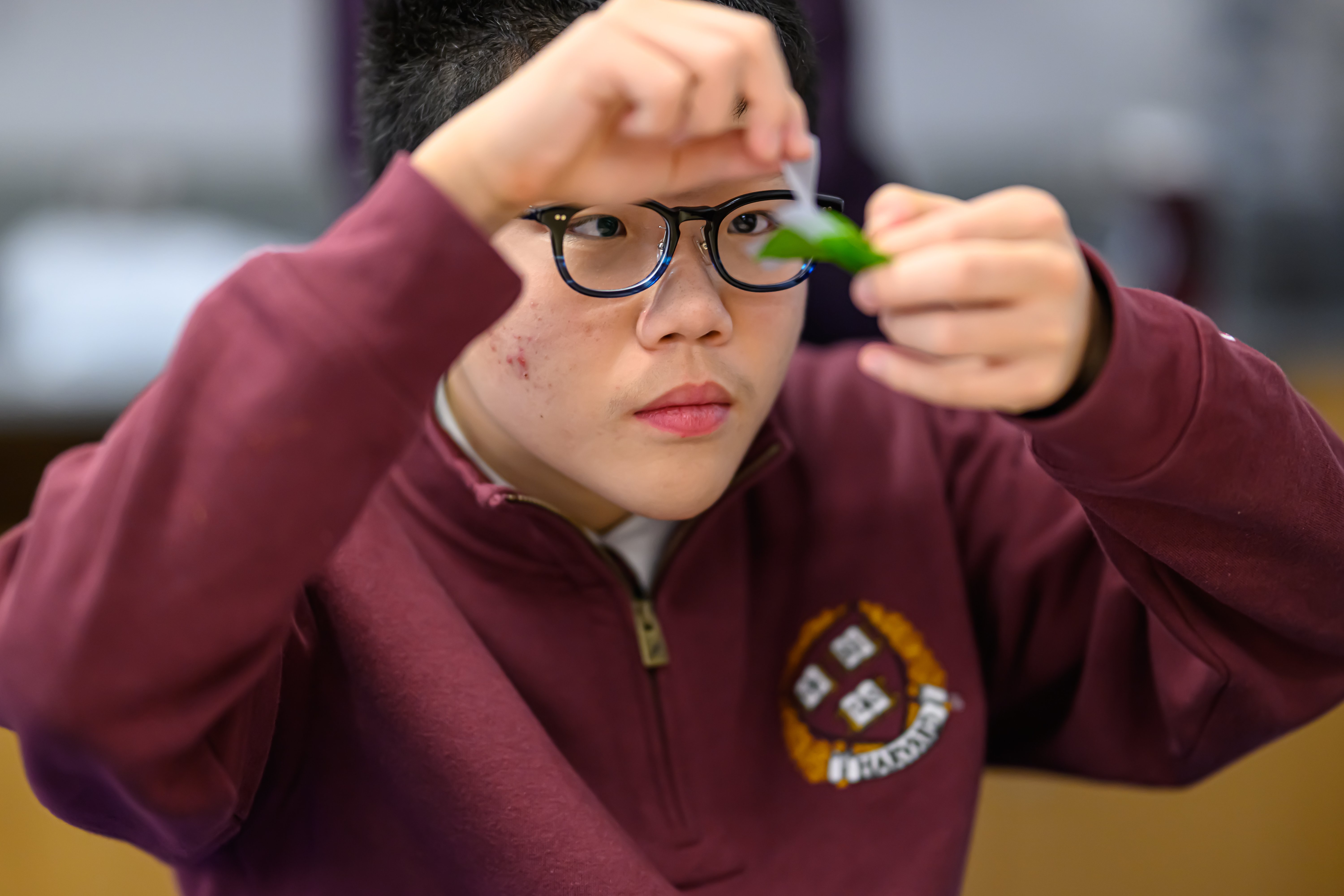 Fessenden student doing an experiment