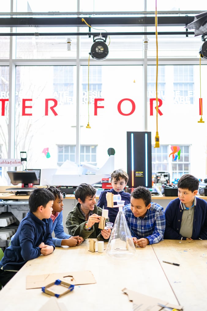 boarding school boys in makerspace