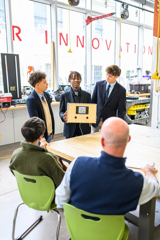 boarding school boys presenting project