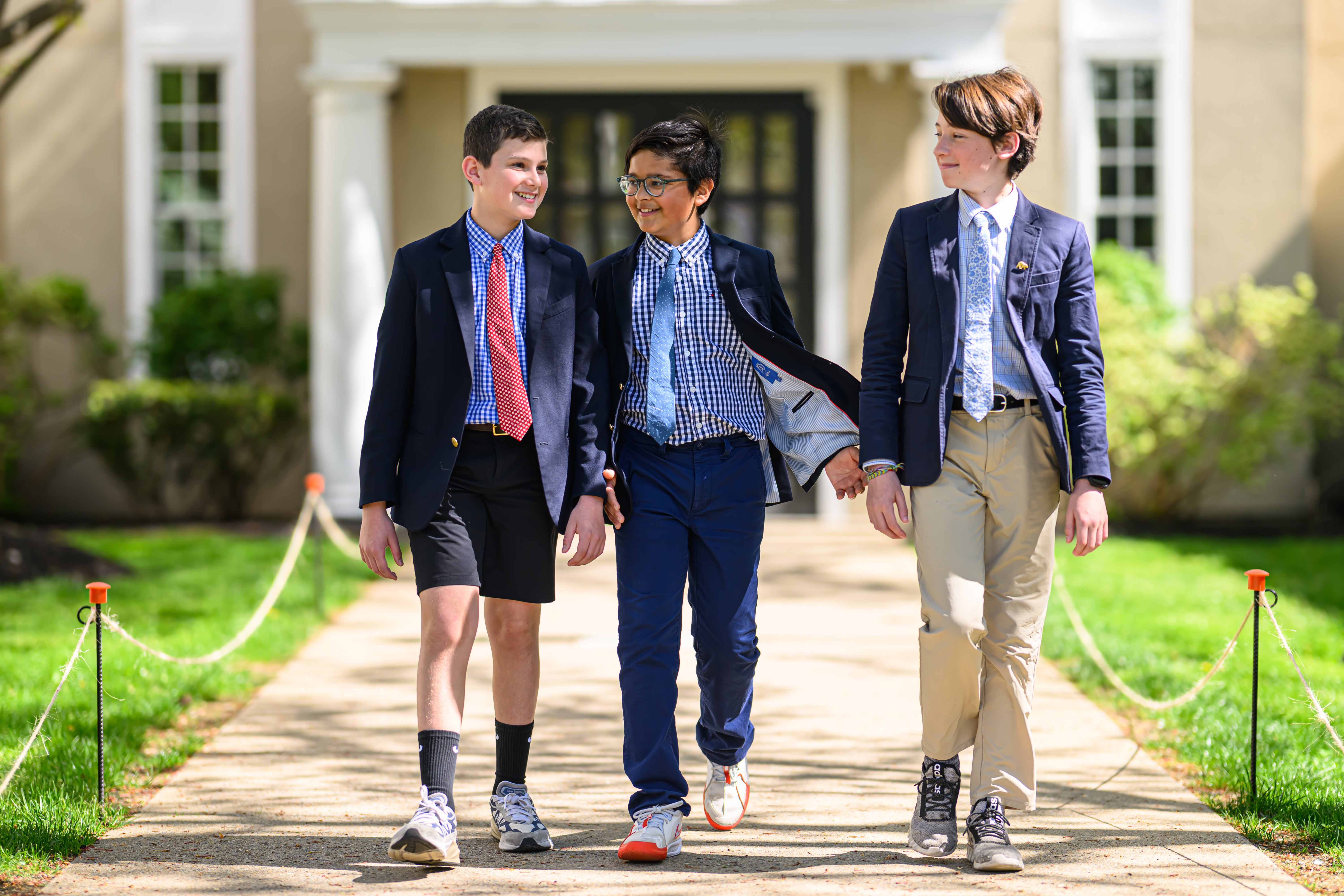 Three middle school boys walking together at Fessenden