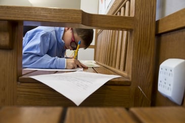 Fessenden fourth grade private school student working on an essay.