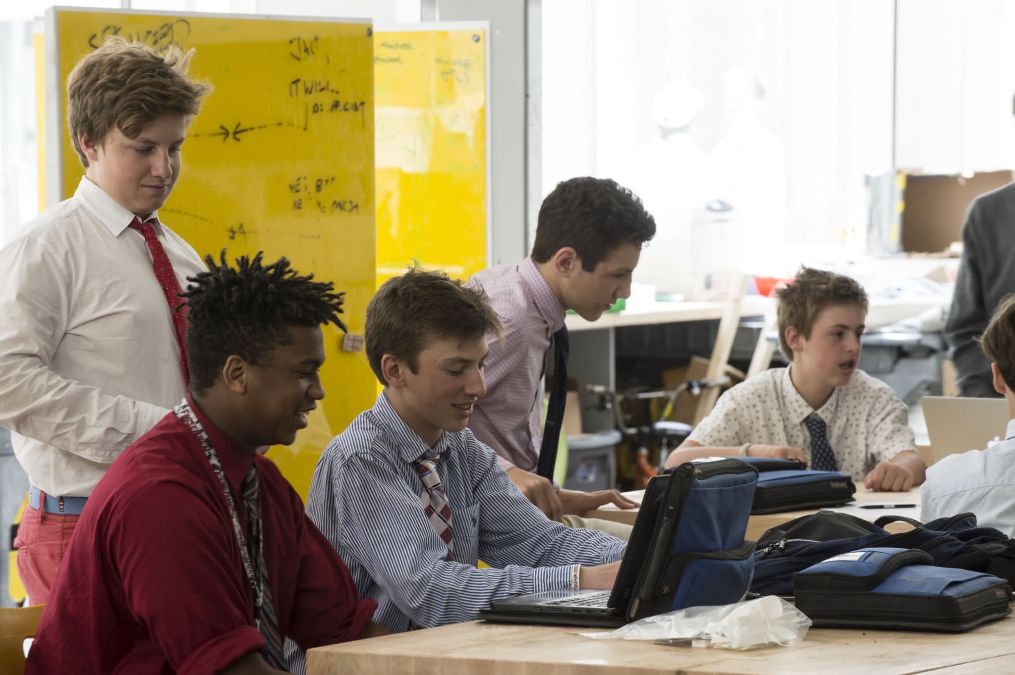Five students at The Fessenden School learn together during class.