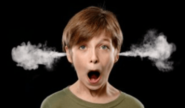 boy with smoke coming out of his ears