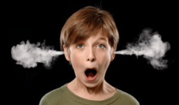 boy with smoke coming out of his ears