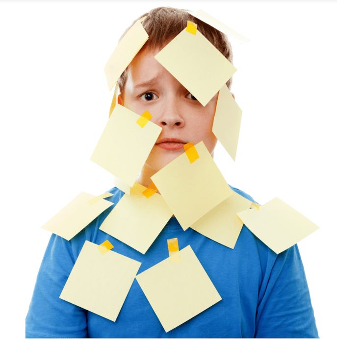 boy covered in post-its