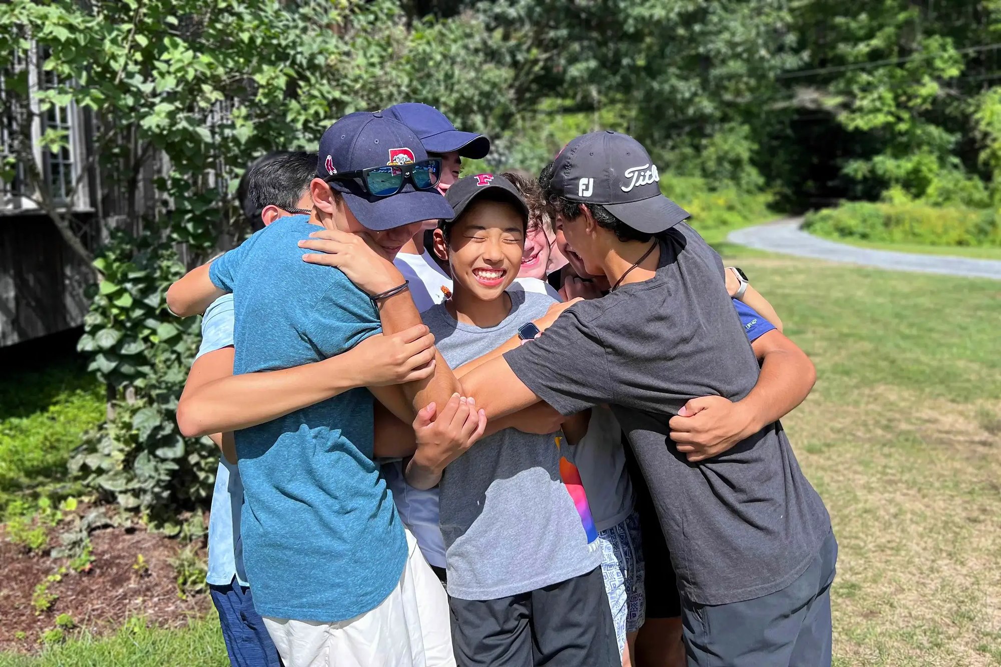 Group of boys hugging