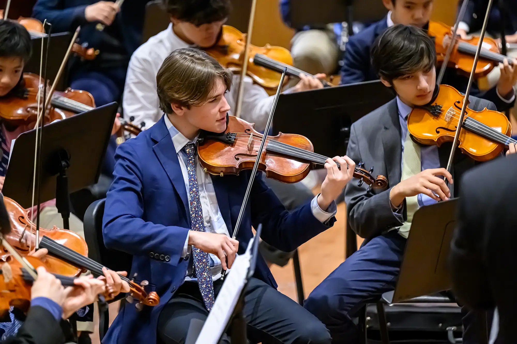 Students playing in orchestra in William R. Elfers Center for the Arts