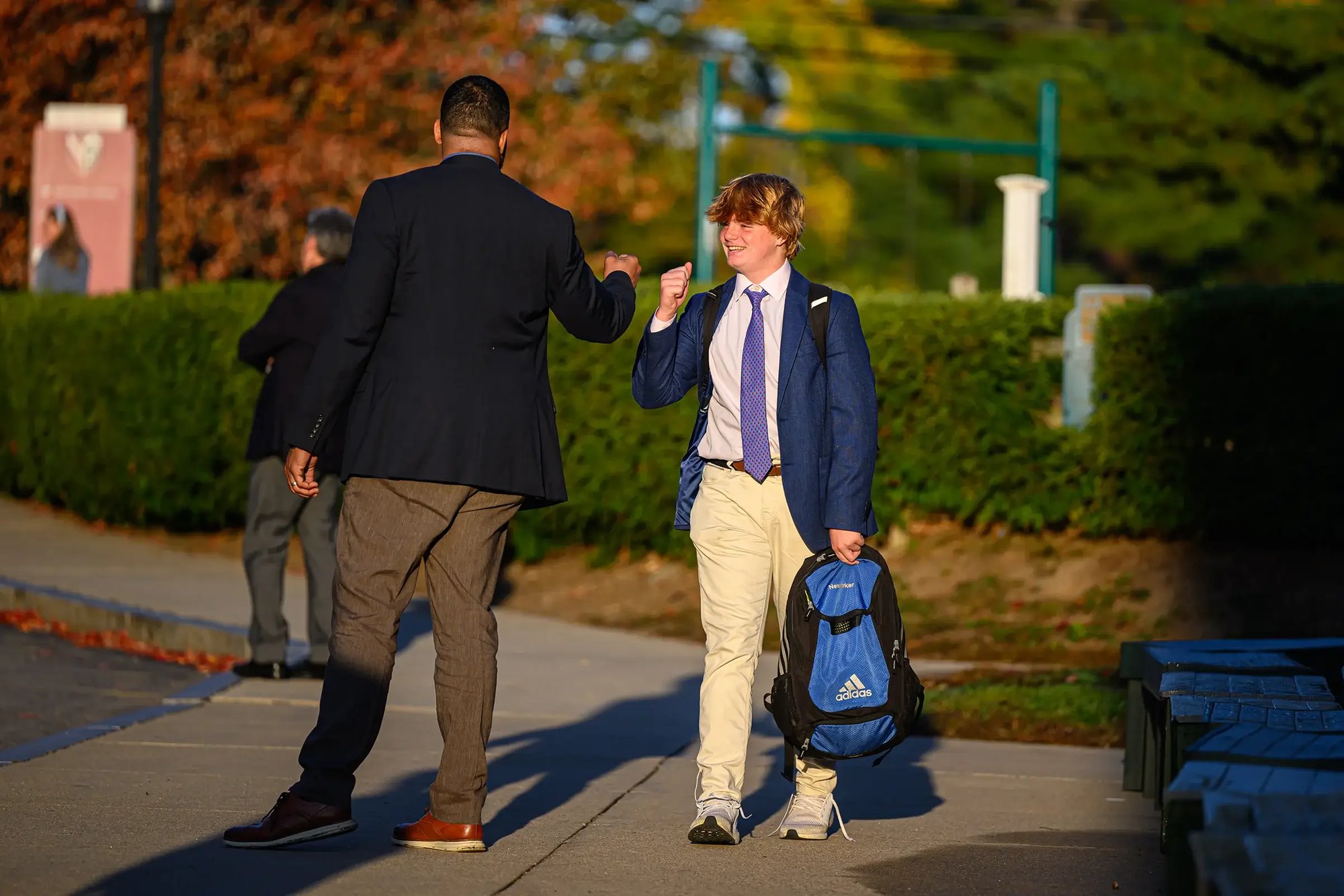 Teacher and student fist-bump