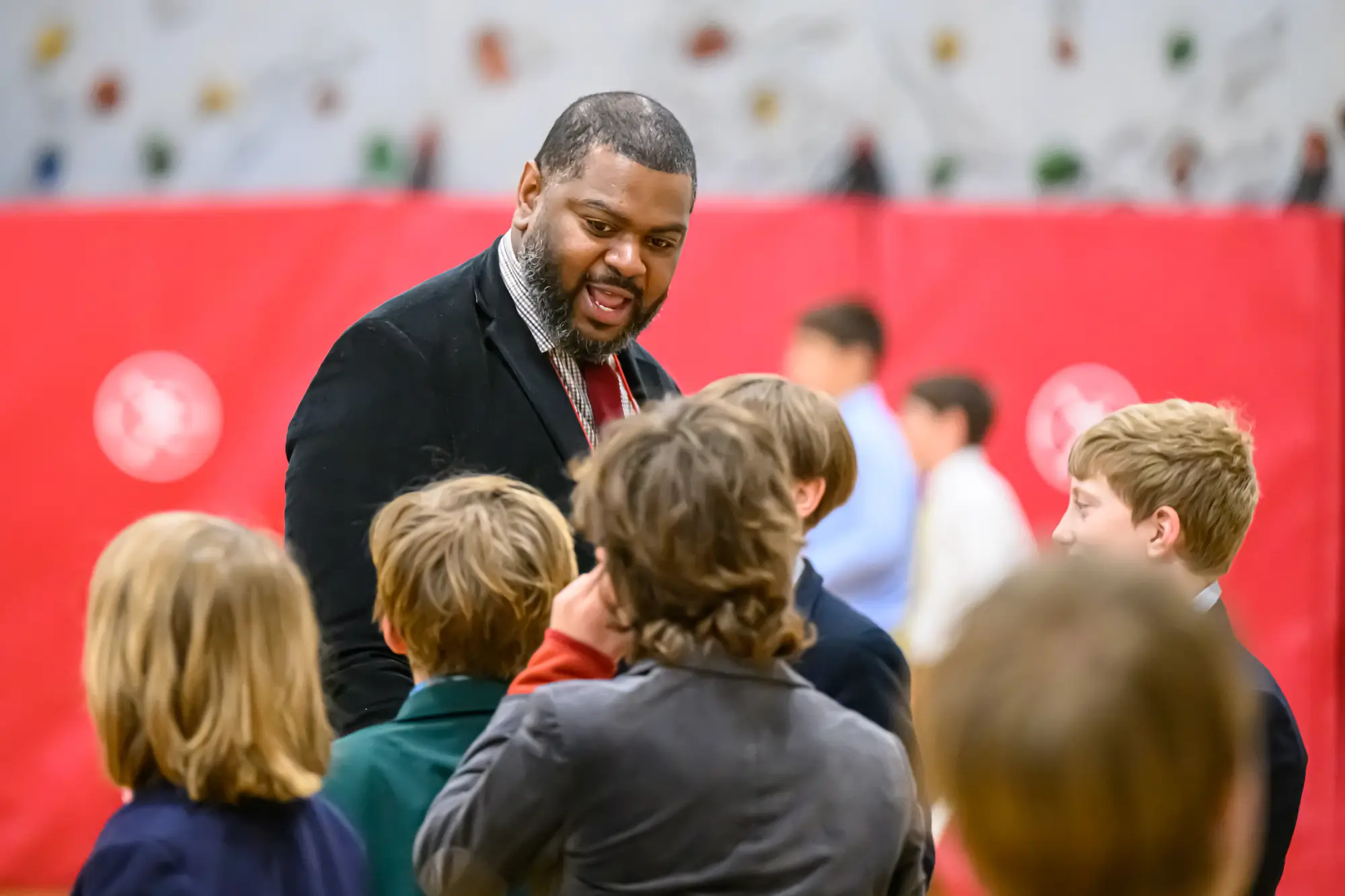 Students interact with a teacher