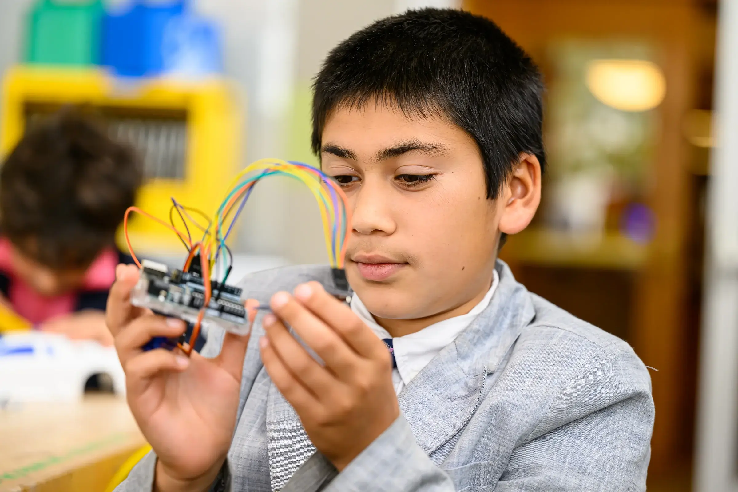 Boy working with electronics