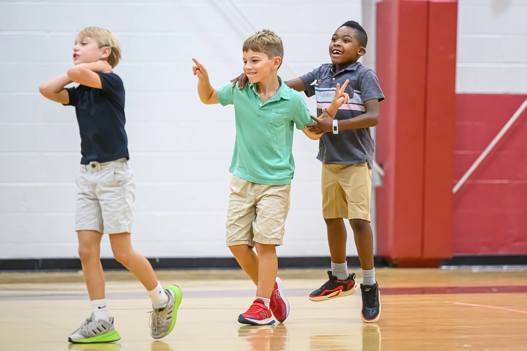 Boys celebrating in gym